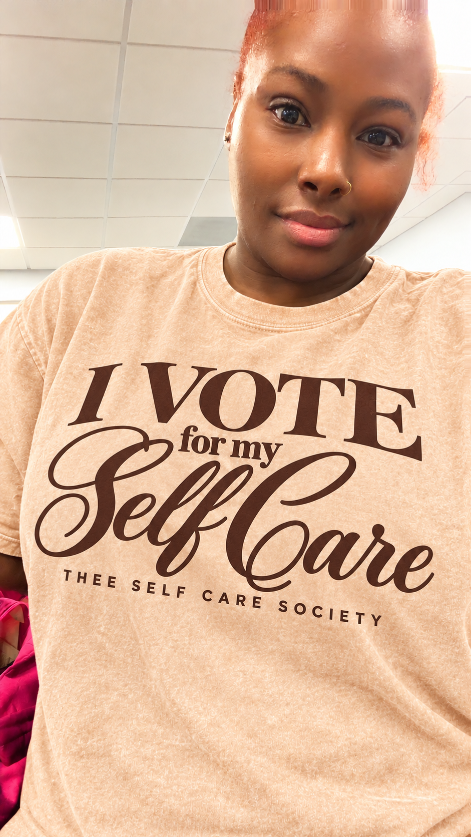 Kelly in the apricot I VOTE for my Self Care tee with chocolate lettering